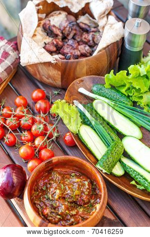 Vegetables And Barbecue Meat On Spring Weekend Picnic.