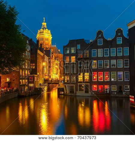 Night City View Of Amsterdam Canal, Church And Bridge