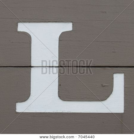 Buchstabe l auf Holzbrett