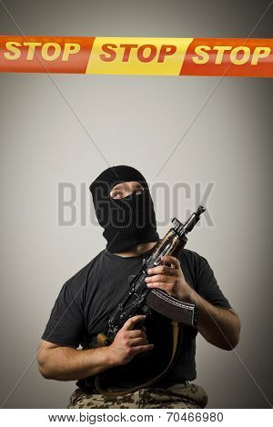 Man With Gun And Stop Line.