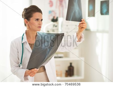 Doctor Woman Looking On Fluorography