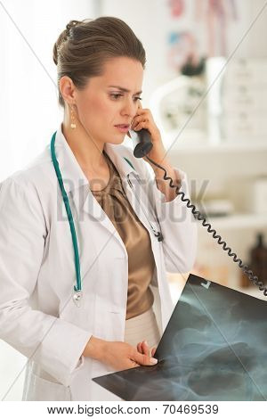 Doctor Woman With Fluorography Talking Phone