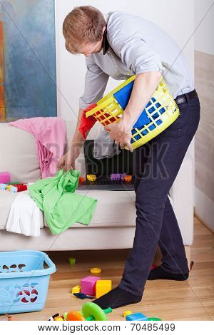 Busy Dad Cleans And Talking On Phone