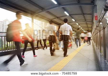 people on pedestrain bridge