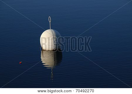 Buoy In Calm Water