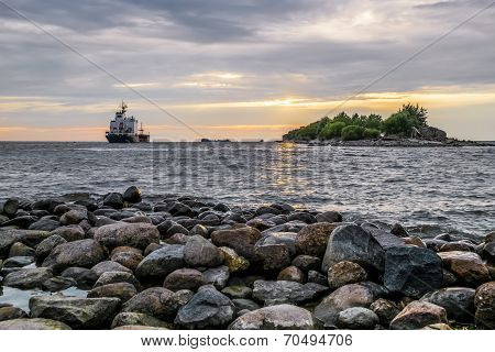 The Ship Goes To Sea From The Port Of St. Petersburg At Sunset