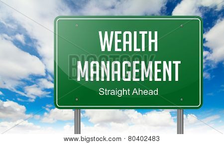 Wealth Management on Highway Signpost.