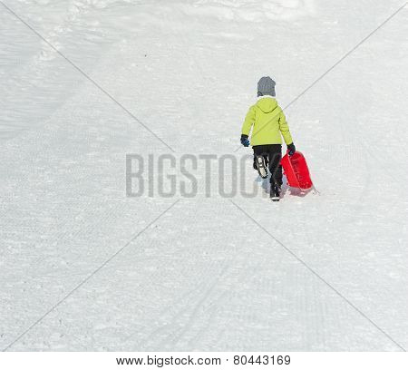 Boy On Sledge