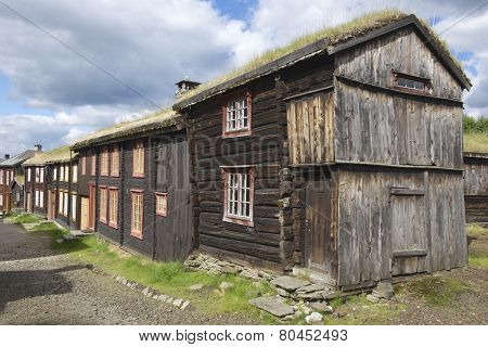 Traditional houses and church bell tower exterior of the copper mines town of Roros Norway.