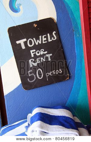 Towels for rent sign in Sayulita, Mexico. 