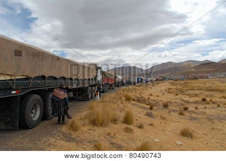 Truck Traffic Along The Road - Ayaviri, Peru