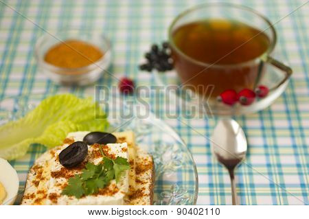 Breakfast sandwich and tea