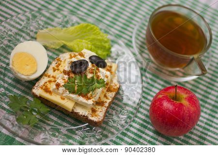 Breakfast sandwich and tea