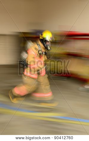 Fire fighers dragging hose