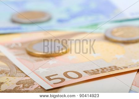 Closeup Of Euro Banknotes And Coins