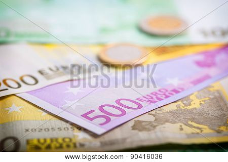 Closeup Of Euro Banknotes And Coins