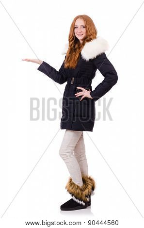 Pretty girl in warm clothes isolated on white