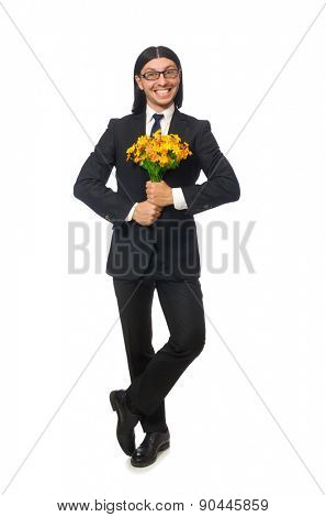 Handsome businessman with flower isolated on white