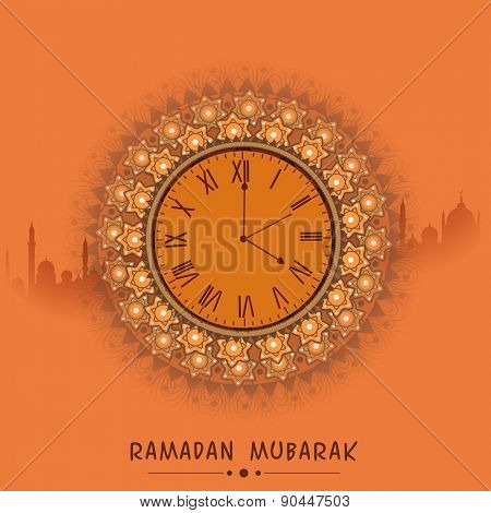 Beautiful clock indicating time for prayers, on mosque silhouetted orange background for holy month of prayers Ramadan Mubarak celebrations. 