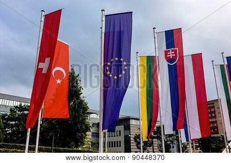 european flag and other flags, symbolism of diplomacy and international cooperation