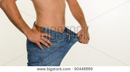 a man has taken off with a successful diet a lot of body weight.