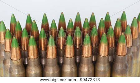 Green Tipped Ammo On White