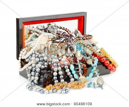 Open box full of jewelry isolated on white