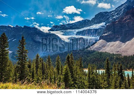 Canada, Alberta, Banff National Park. The famous Glacier Crowfoot over Bow River