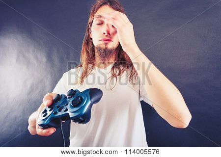 Unhappy Male Playing Games