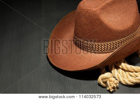cowboy hat on wooden background