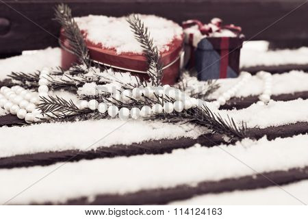 White Pearl Necklace, Red Heart Shaped Tin Box With A Gift Box And A Fragment Of A Pine-tree Branch