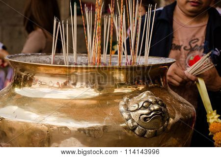Joss Stick Burn On Th Box At Chinese Shrine For Making Merit In Chinese New Year Festival. Pray For