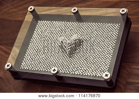 Heart Form On Pin Board Toy