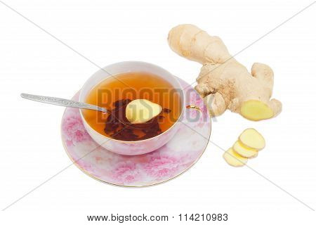 Ginger Tea On A Background Of Ginger Root