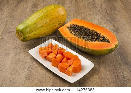 Fresh Cut Juicy Tropical Papaya Mamao Fruit With Seeds At Brazilian