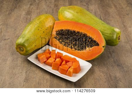 Fresh Cut Juicy Tropical Papaya Mamao Fruit With Seeds At Brazilian