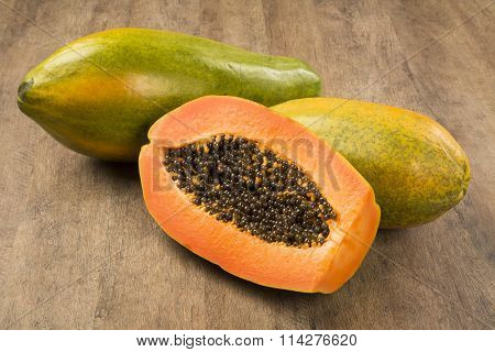 Fresh Cut Juicy Tropical Papaya Mamao Fruit With Seeds At Brazilian