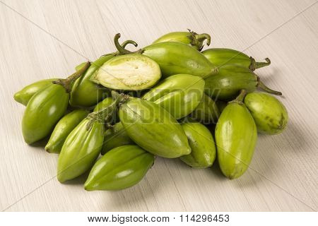 Some Green African Eggplants Over A White Background