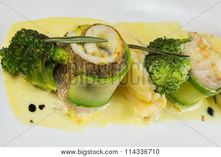 Fish with vegetables. Beautiful layout on a plate