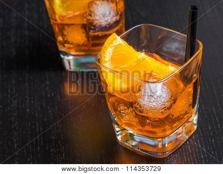 Two Glasses Of Spritz Aperitif Aperol Cocktail With Orange Slices And Ice Cubes