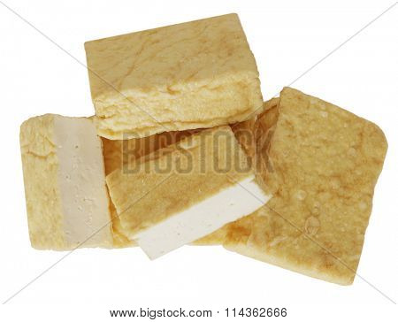 Pile of tofu blocks isolated on white