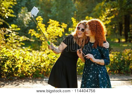 Two Girls Make Selfie.
