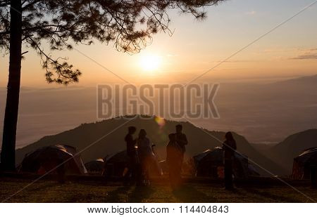 Unidentified group of people Watching sunrise at Camping site in Doi Ang Khang Chiang Mai Thailand