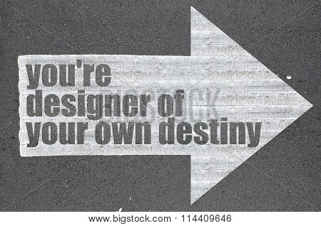 Arrow On Asphalt Road Written Word You're Designer Of Your Own Destiny