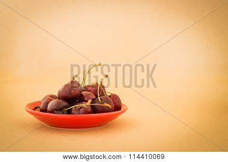 Group Of Cherries On Warm Vintage Background