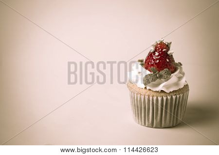 Strawberry Cupcake  with Pistachio And Cream Create With Filter,selective Focus,vintage Tonin