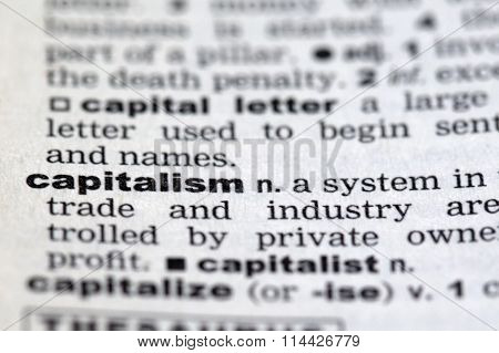 Closeup of the dictionary details of the word capitalism