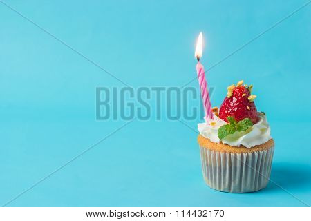 Strawberry Cupcak Topping With Pistachio And Cream,selective Focus