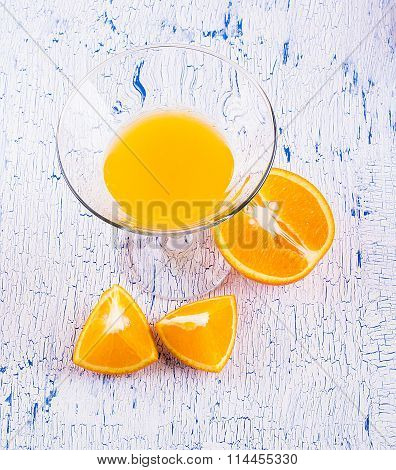 Orange juice, and orange segment on an
