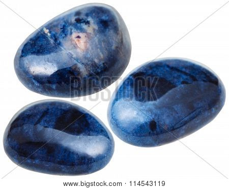 Three Dumortierite Gemstones Isolated On White